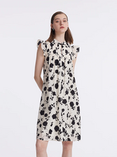 a lady in a rose printed ruffle sleeves doll dress